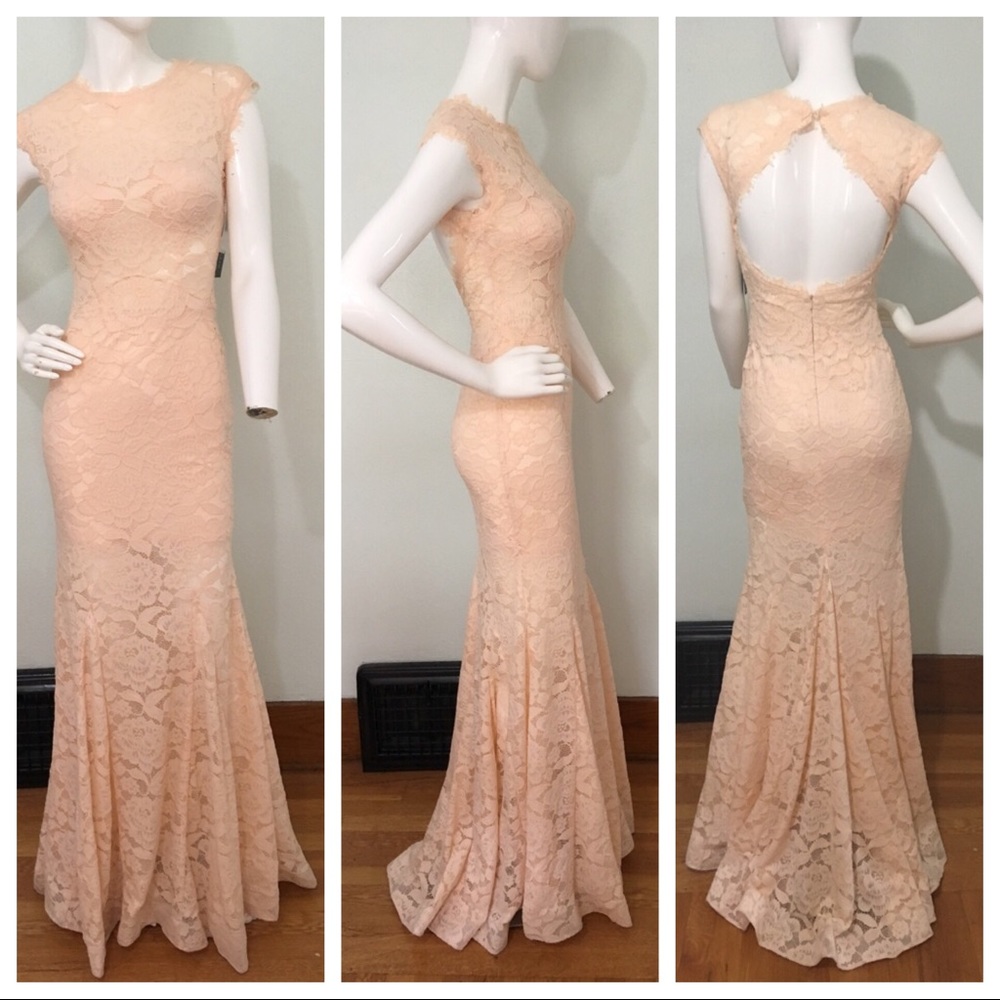 Betsy & Adam open-back mermaid lace dress.